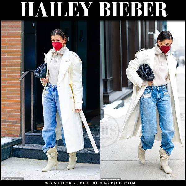 Hailey Bieber in white trench coat, jeans and suede beige boots