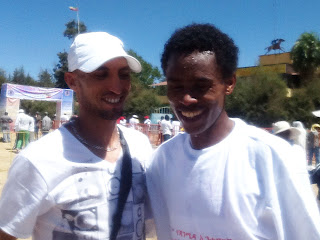 Aissa Dghoughi with Ethiopian marathoner Feyisa Lilesa