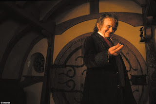 Bilbo Baggins nas trilogias "O Senhor dos Anéis" e "O Hobbit".         Ian Holm   Ian Holm