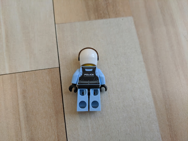 Back of the female cop minifigure