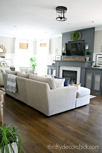 Dark gray fireplace with built ins