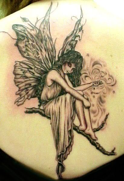 simple angel tattoos. angel on limb tattoo.
