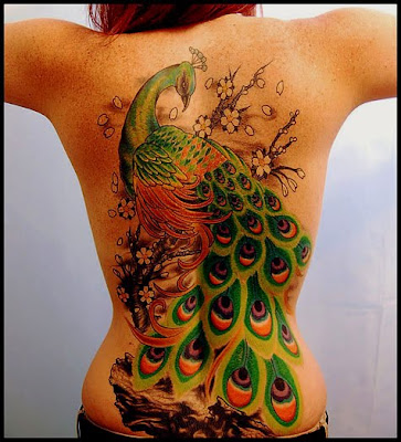 back piece tattoo. She had a couple older tattoos