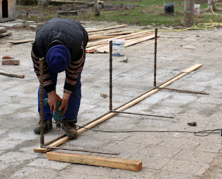 Drilling out screw holes to fix it to the wooden top