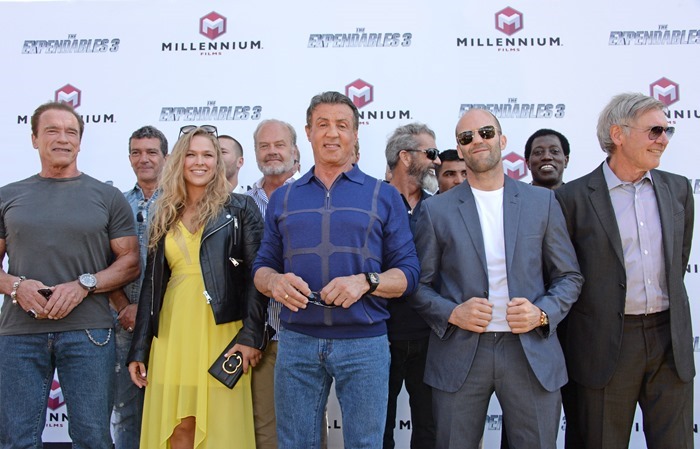 CANNES, FRANCE - MAY 18:  (L to R) Arnold Schwarzenegger, Antonio Banderas, Ronda Rousey, Glen Powell, Kelsey Grammer, Sylvester Stallone, Mel Gibson, Victor Ortiz, Jason Statham, Wesley Snipes and Harrison Ford attend a photocall for "The Expendables 3" at the Carlton Hotel on May 18, 2014 in Cannes, France.  (Photo by David M. Benett/Getty Images for Millennium Films)