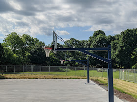 new basketball hoops installed at Fletcher Field