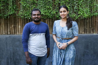 Keerthy Suresh in Blue Dress with Cute and Lovely Smile with a Fan 5