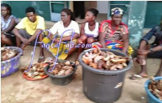 Sapele Cow Skin or Kpomo Traders in front of the police station, after being arrested