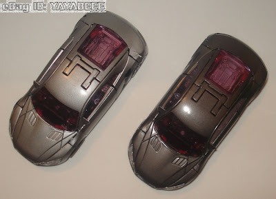 Sideways: Hasbro on left, Takara on right