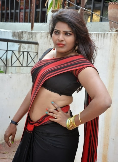 Telugu actress Sitara in a black saree, exuding elegance and grace.