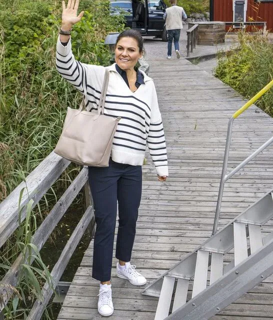 Crown Princess Victoria wore a new ivory cashmere navy striped jumper by Soft Goat. Marine Archaeological Museum