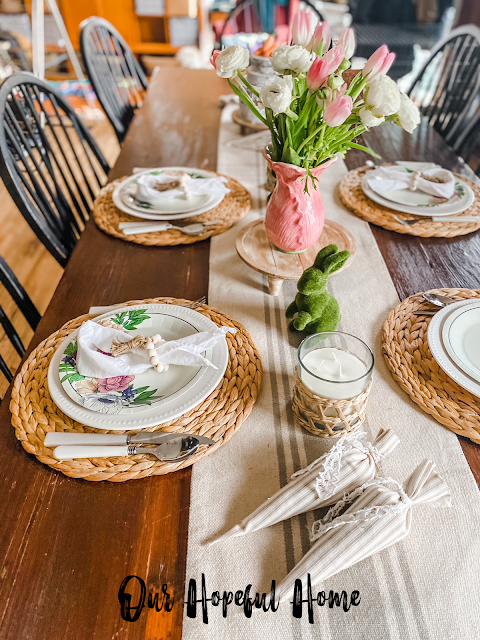 Easter tablescape plates moss bunny candles table runner