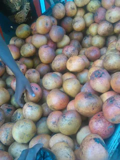 Fruits being sold on the road by a hawker in Nyeri.