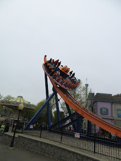 People Riding Revolution Ride Spinning Lake Compounce Amusement Park