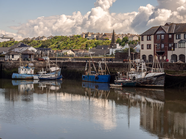 Photo of reflections in Maryport Harbour