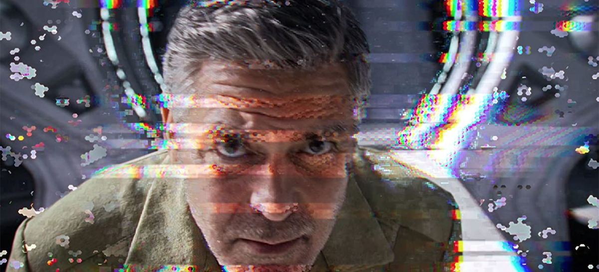 Glitchy image of George Clooney's Frank looking into camera/viewer