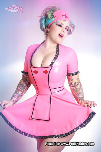Nurse play in pink latex mini-dress uniform