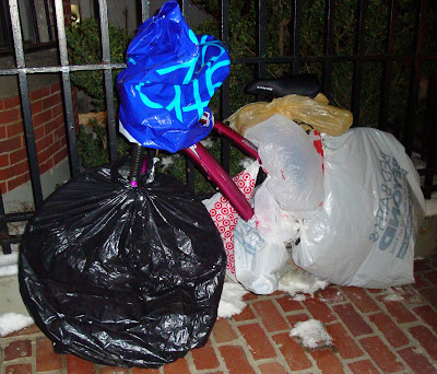 Boston bike covered in shopping bags to protect it for winter