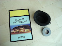 Monopoly card lying on floor from Belfast edition - Waterfront Hall