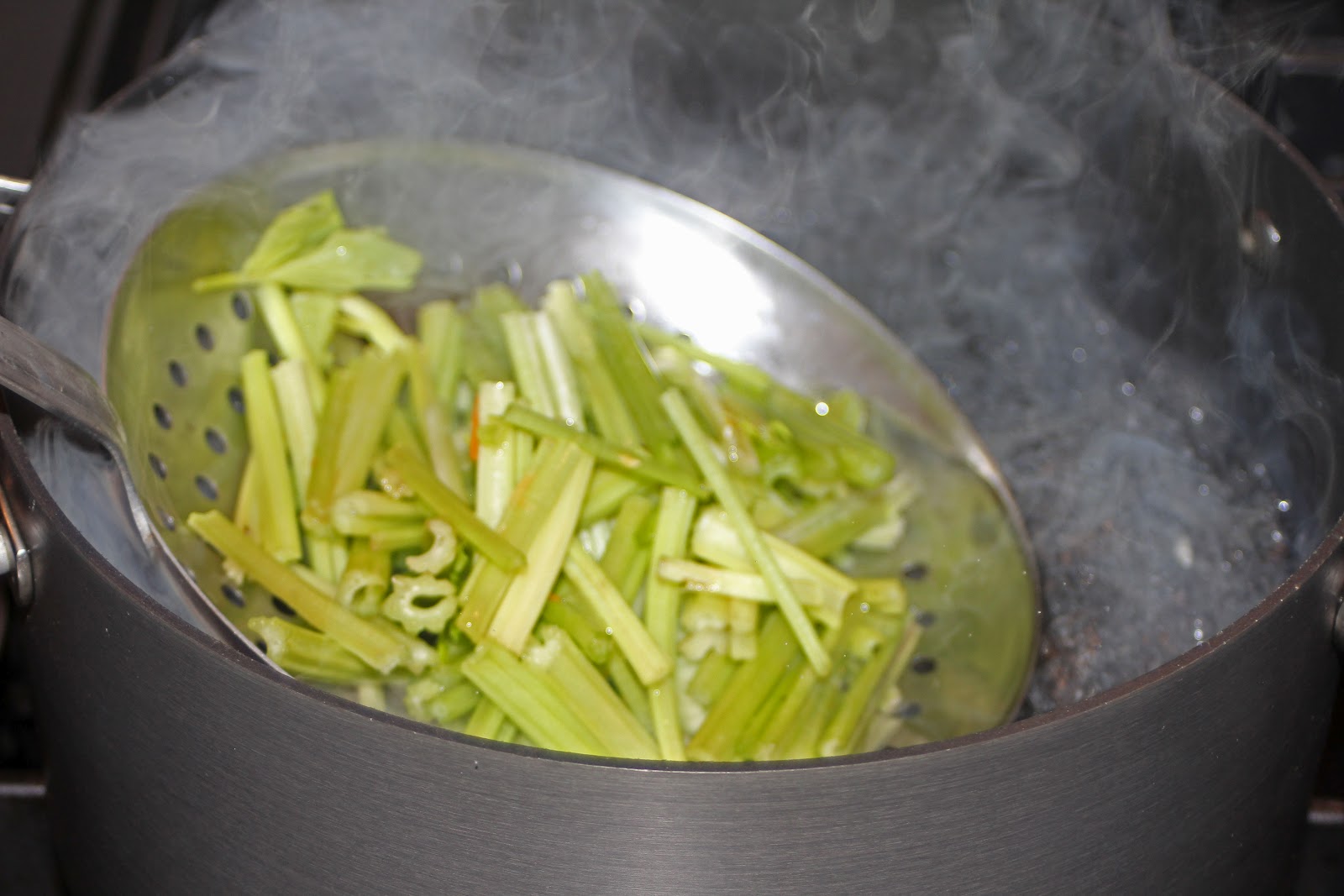 Blanch the celery in boiling water for 10 seconds.