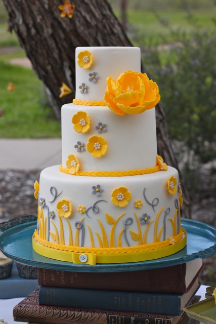 They had vintage styling and books stacked for the cake