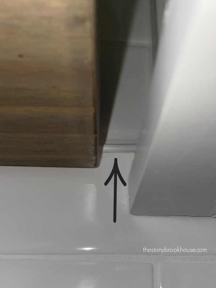 Wire at back of shelf