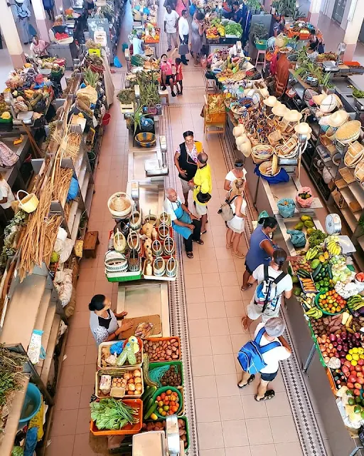 Visiting the fabulous local market of Mindelo, Sao Vicente island, in Cape Verde, picking up a selection of fresh fruit and vegetables for their journey