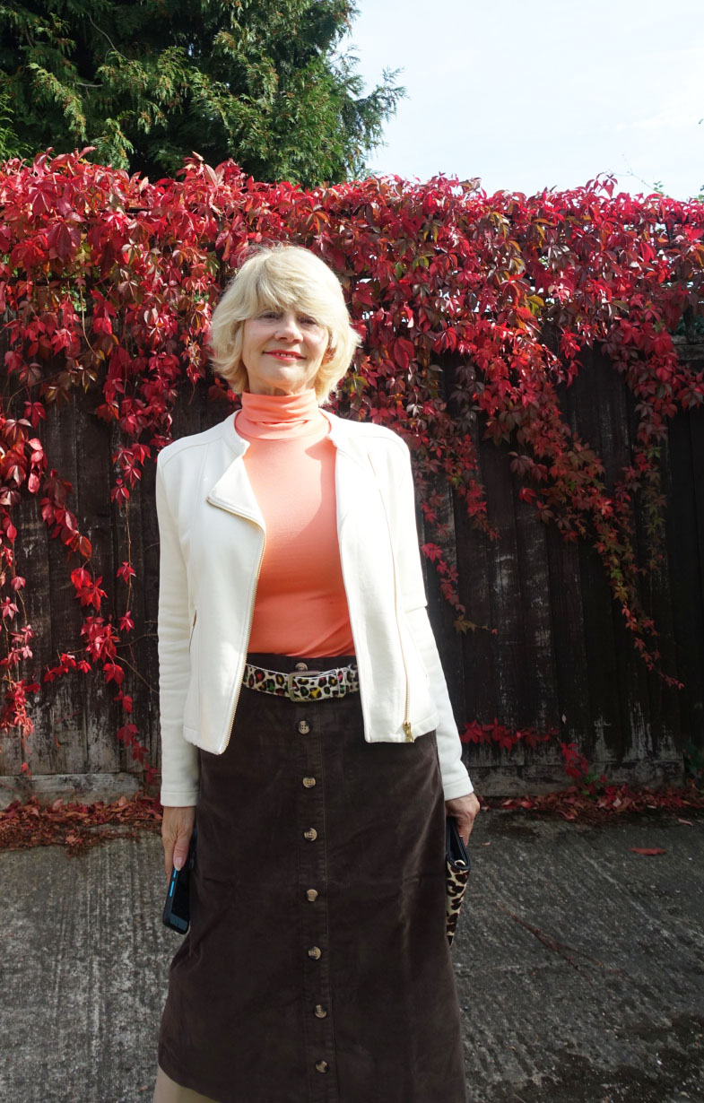 Brown corduroy skirt from Cotton Traders worn with cream and coral by the over-60s blog Is This Mutton
