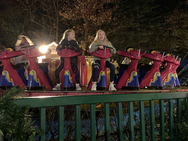 Dizzy Disk Dollywood Amusement Park Ride at Night