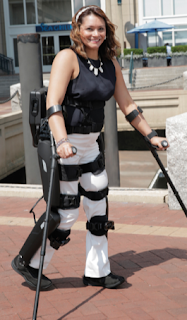 Image of Woman using Exoskeleton to walk 