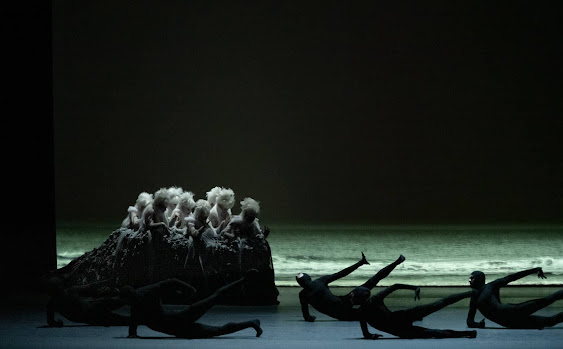 Dancers embodying waves and a siren-encrusted rock at the Boston Ballet
