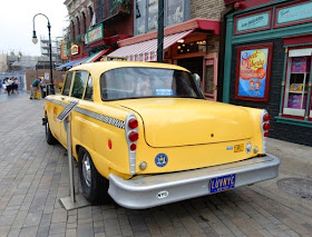 Blue Collar yellow NYC taxi