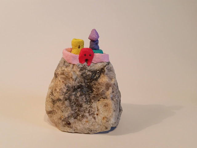 Stone with a colorful castle.