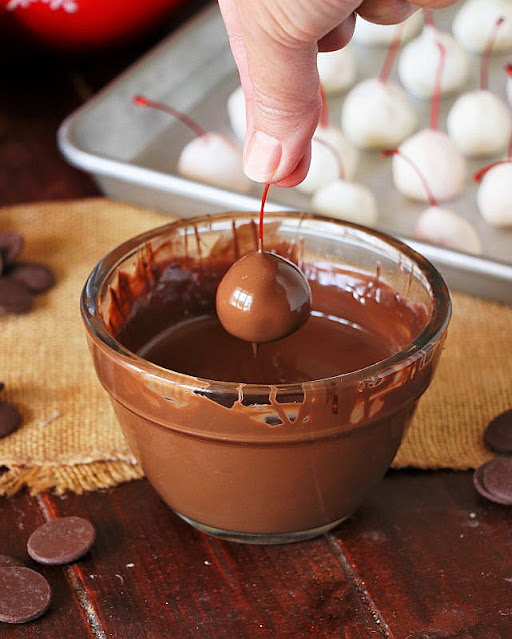 Homemade Chocolate Covered Cherry Dipped in Melted Chocolate Image