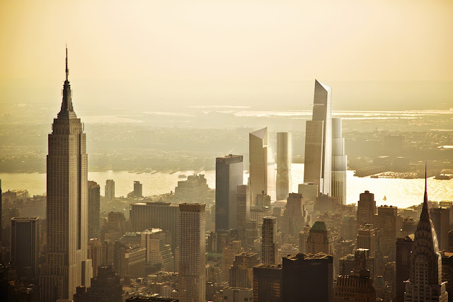 Picture of four new buildings as seen from the air above the Midtown with Empire State Building in the left