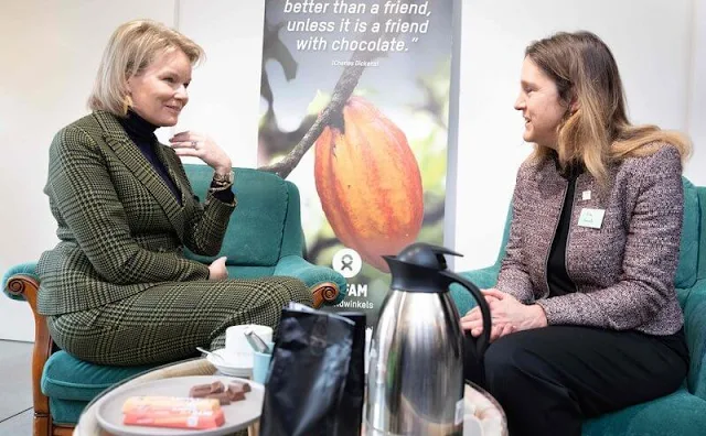 Queen Mathilde wore a green checked double breasted blazer suit by Natan, and black turtleneck wool cashmere jumper by Natan