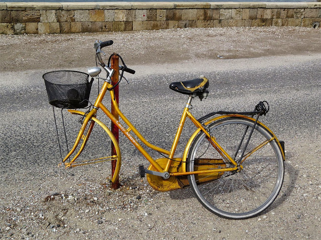 Bicycle abandoned on the lungomare, Livorno