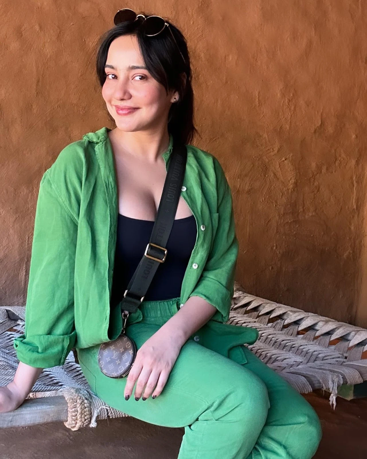 neha sharma cleavage black top green shirt