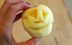 carved apple face for shrunken apple head