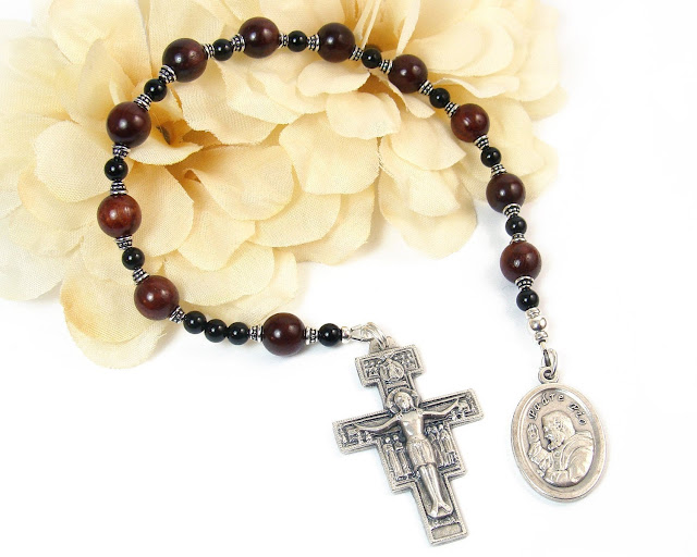 https://www.etsy.com/prettygonzo/listing/758746559/st-padre-pio-pocket-rosary-st-pio?ref=shop_home_active_34