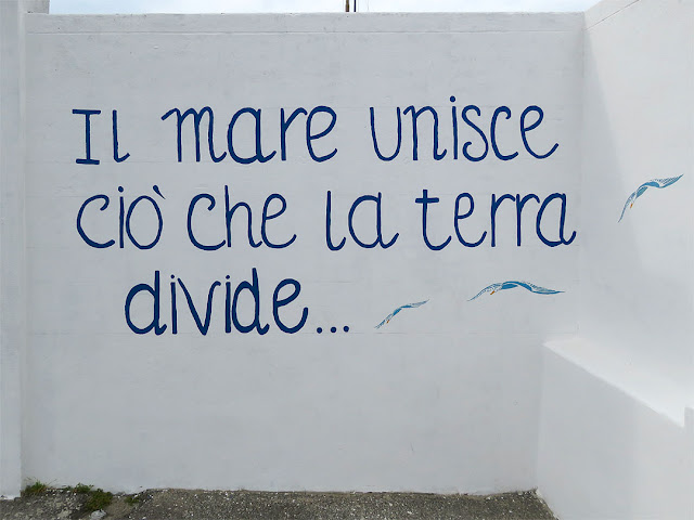 What the land divides the sea unites, Via del Molo Mediceo, Livorno