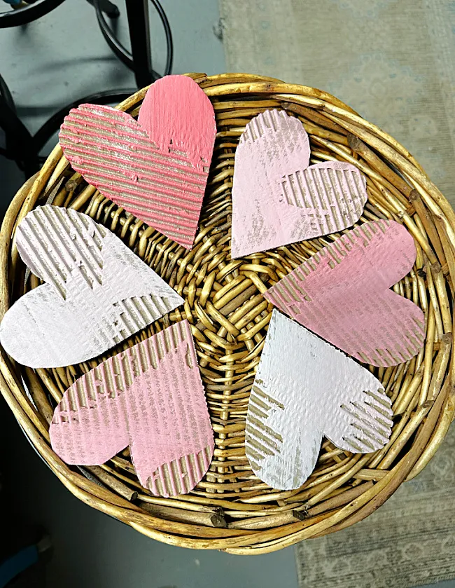 pink corrugated hearts in basket