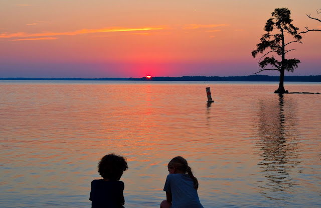 best friends sunset water