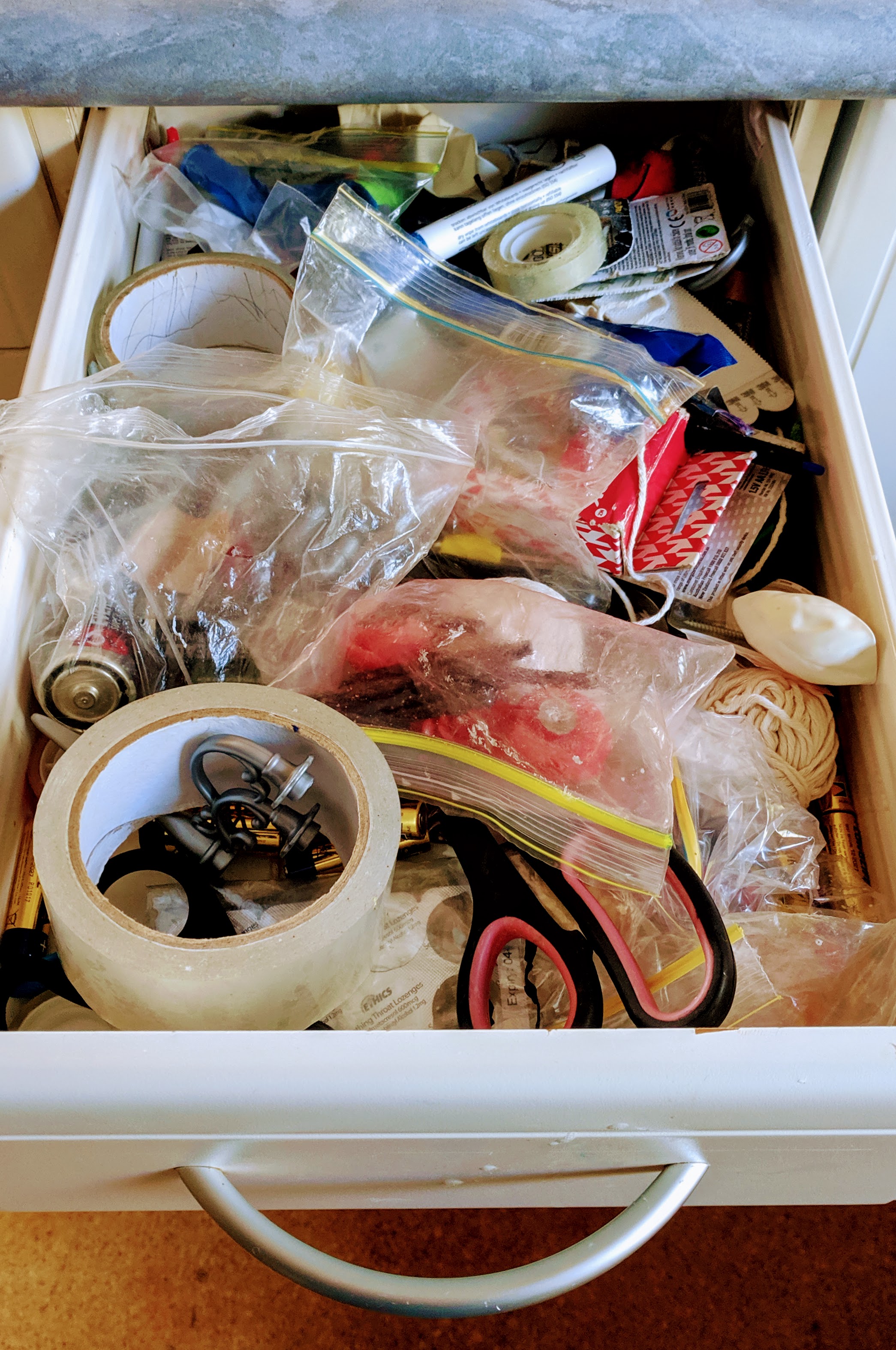 A third drawer down that's just full of shit