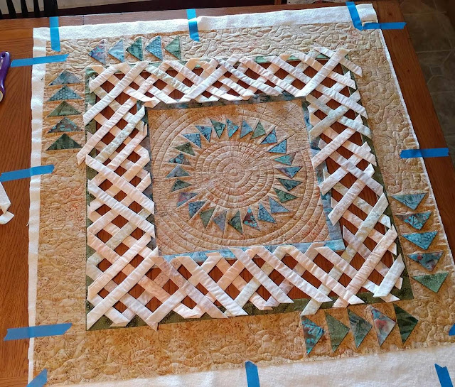 Open weave batik lattice quilt with prairie points