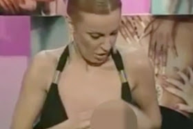 TV presenter accidentally flashes boobs on live show (PHOTOS)