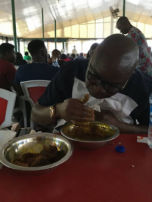 Image result for See governor Fayose eating Amala at a local joint in Abuja