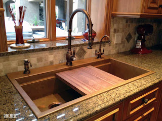 Workstation copper sink replaced an old triple bowl sink