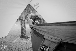 Justin Fricke under is ENO ProFly Tarp in his hammock