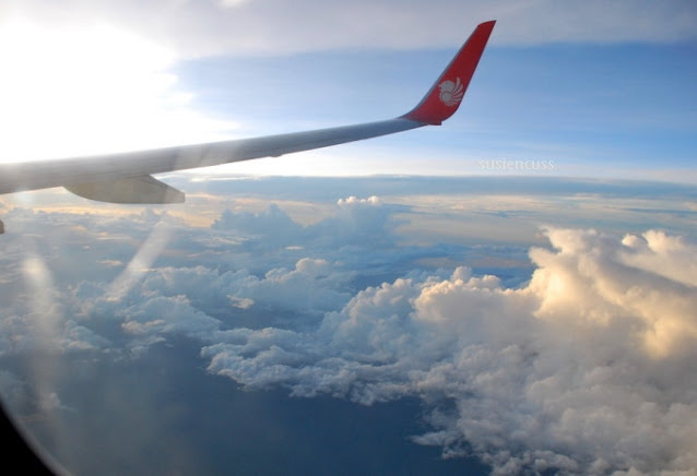 sunrise di atas awan